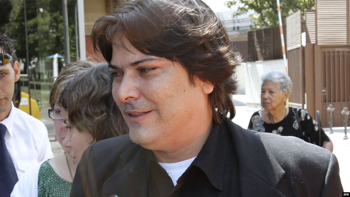 Notes from the Cuban Exile Quarter Cuban national with passport in